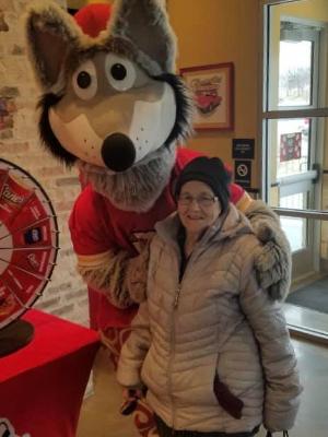 Mom after her one of her chemo treatments with KC Wolf!!